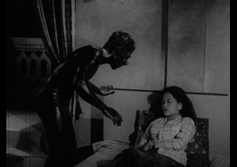 Still from 'Orang Minyak' (Film source: Asian Film Archive. Courtesy of ©Cathay-Keris Film Pte. Ltd.)    