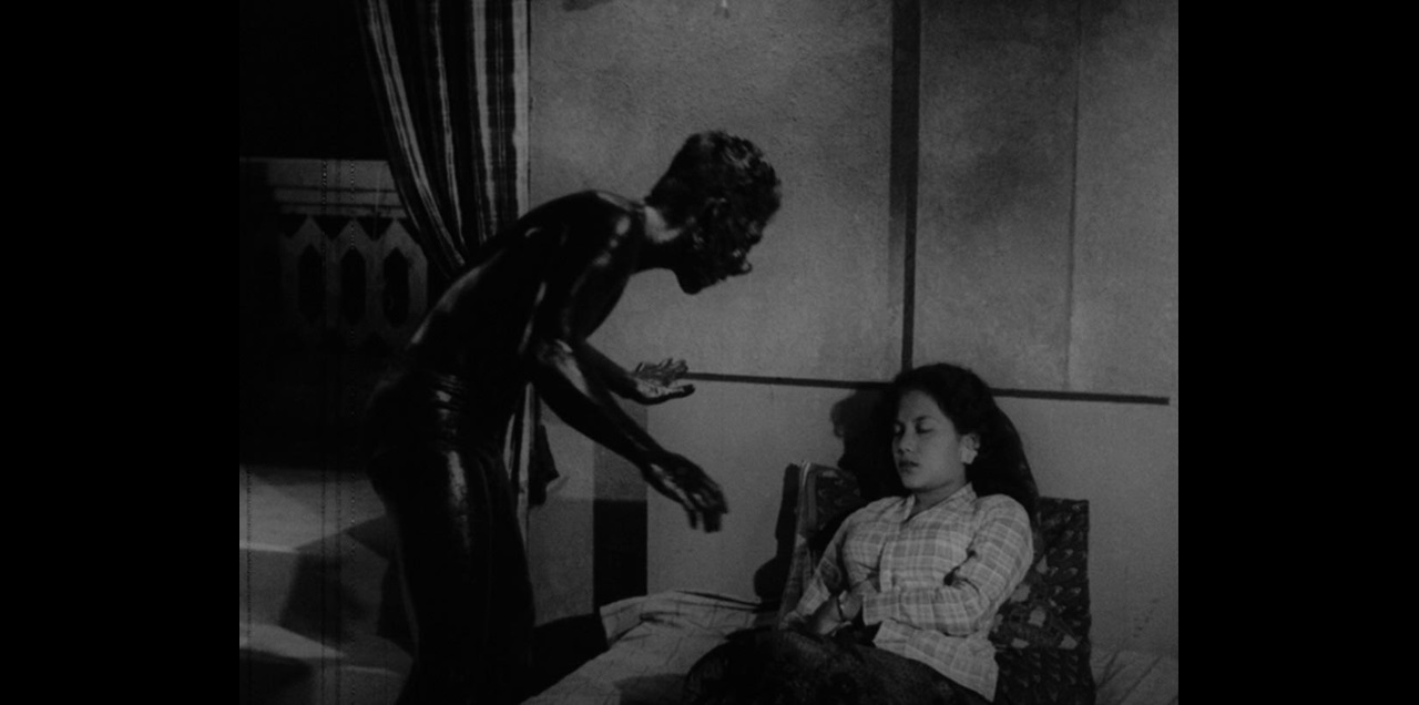 Still from 'Orang Minyak' (Film source: Asian Film Archive. Courtesy of ©Cathay-Keris Film Pte. Ltd.)    