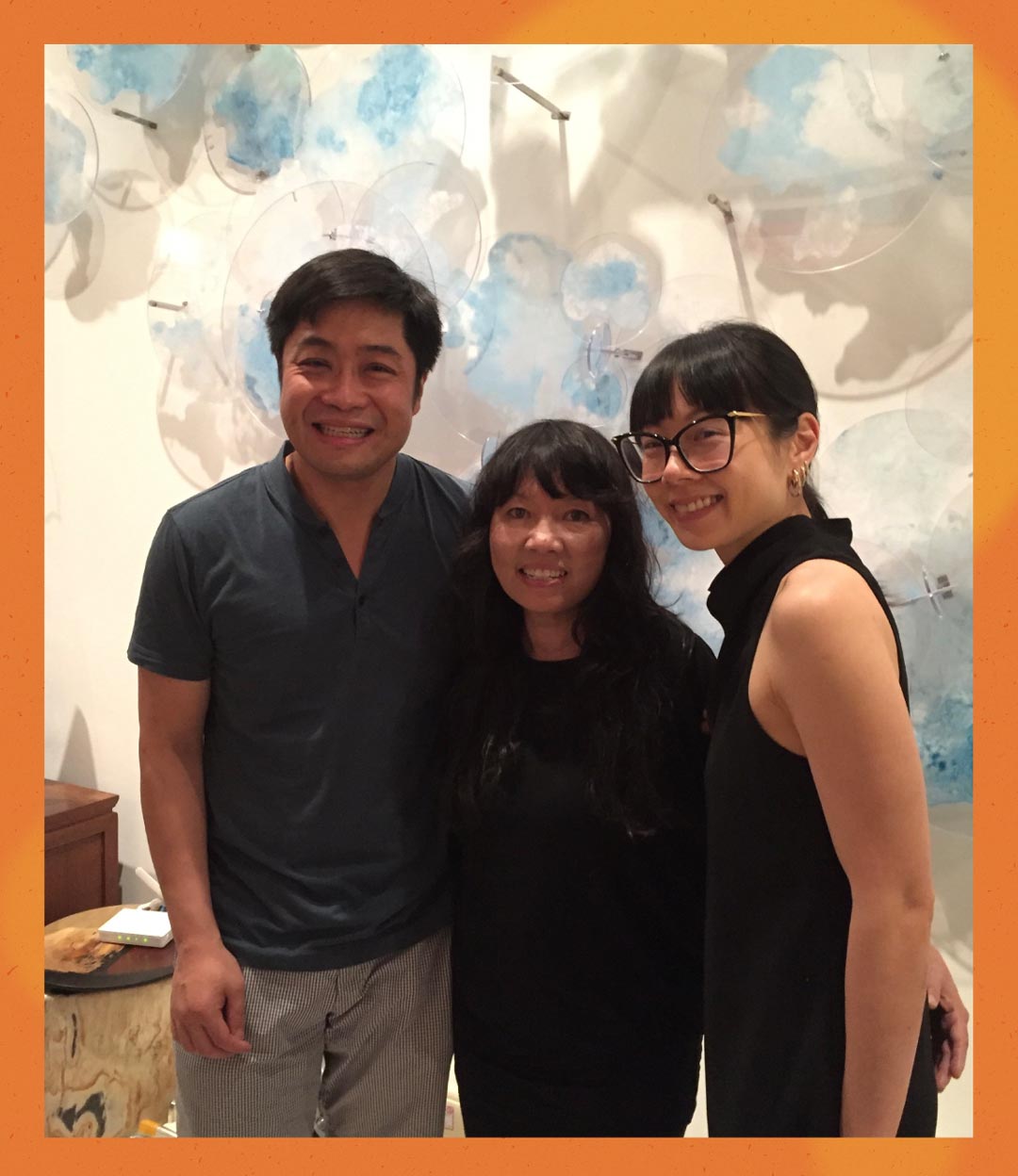 Kenneth and his wife Penny (right) with the artist Suzann (middle).