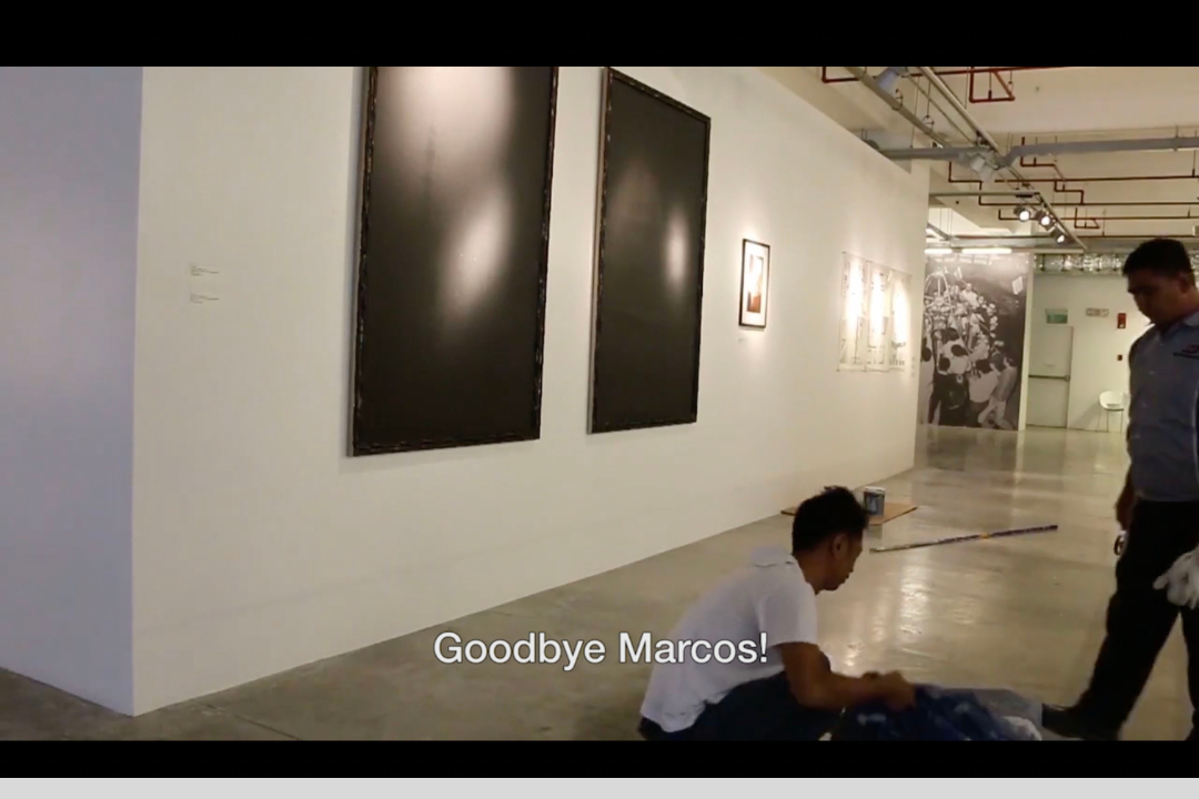 Pio Abad. ‘Imelda as Maganda & Ferdinand as Malakas, painted black after the events of 18 November 2016’ (still). 2014–2016. Black paint on digitally printed canvas and faux gold bamboo frame; framed giclee print on Hahnemuhle Baryta paper and video. Collection of Singapore Art Museum. Image courtesy of the artist.