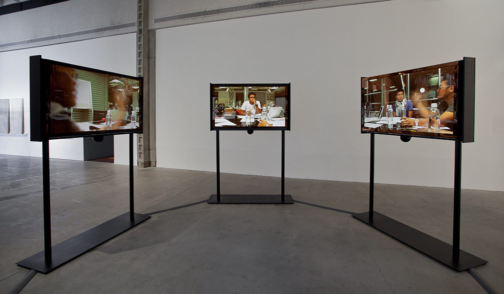 The Propeller Group. ‘Television Commercial for Communism.’ 2011–2012. 3-component video installation. 140 x 350.5 cm. Collection of Singapore Art Museum. Image courtesy of the artist.